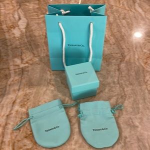 Tiffany ring box 2"x 2"x2" w small gift bag, and 2 jewelry pouches.